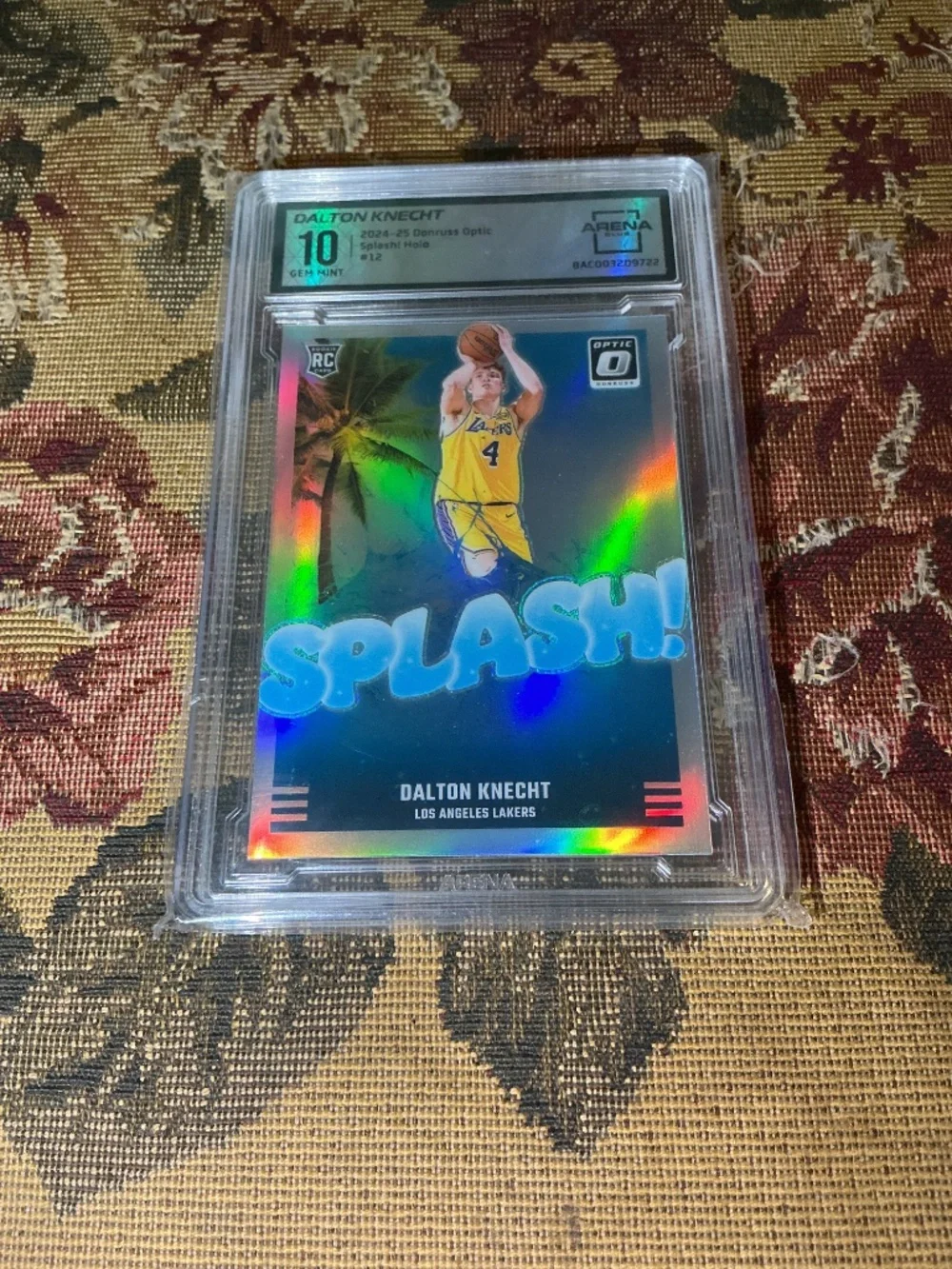 2024-25 Panini Donruss Optic Splash Dalton Knecht #12 Holo rookie grade Arena 10